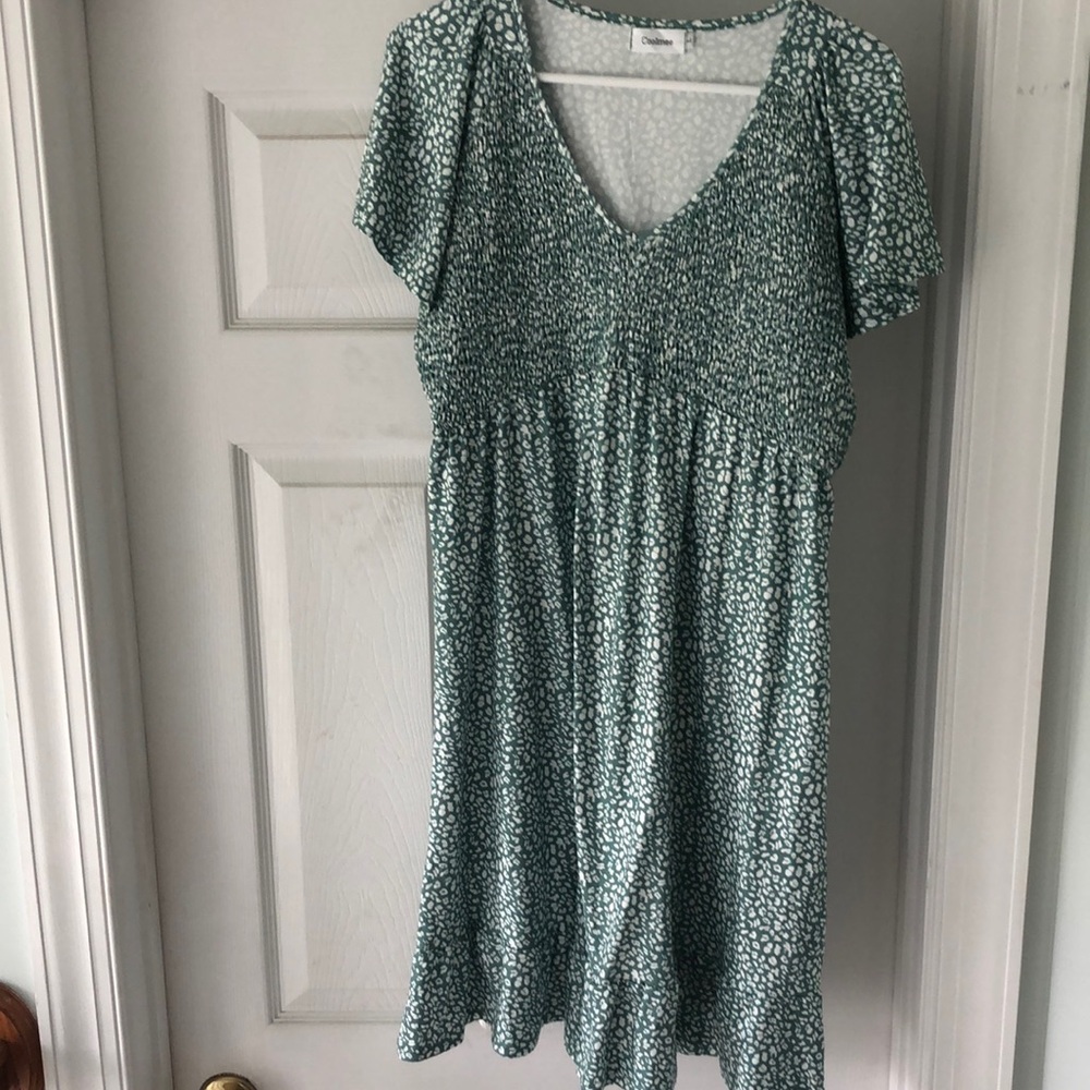 Summer dusty green dress with flutter sleeves and ruffle around bottom